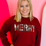 Soft Luxe pullover with festive plaid patch details for holiday styling.