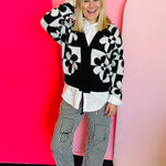 Black and white flower print button up cardigan.