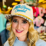 Poppy and Pine Cream polka dot faith hat with blue “Make Heaven Crowded” embroidery and zebra print bill.