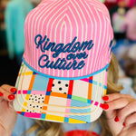 Pink striped faith hat with “Kingdom Over Culture” embroidery, pastel patchwork brim, adjustable snapback.