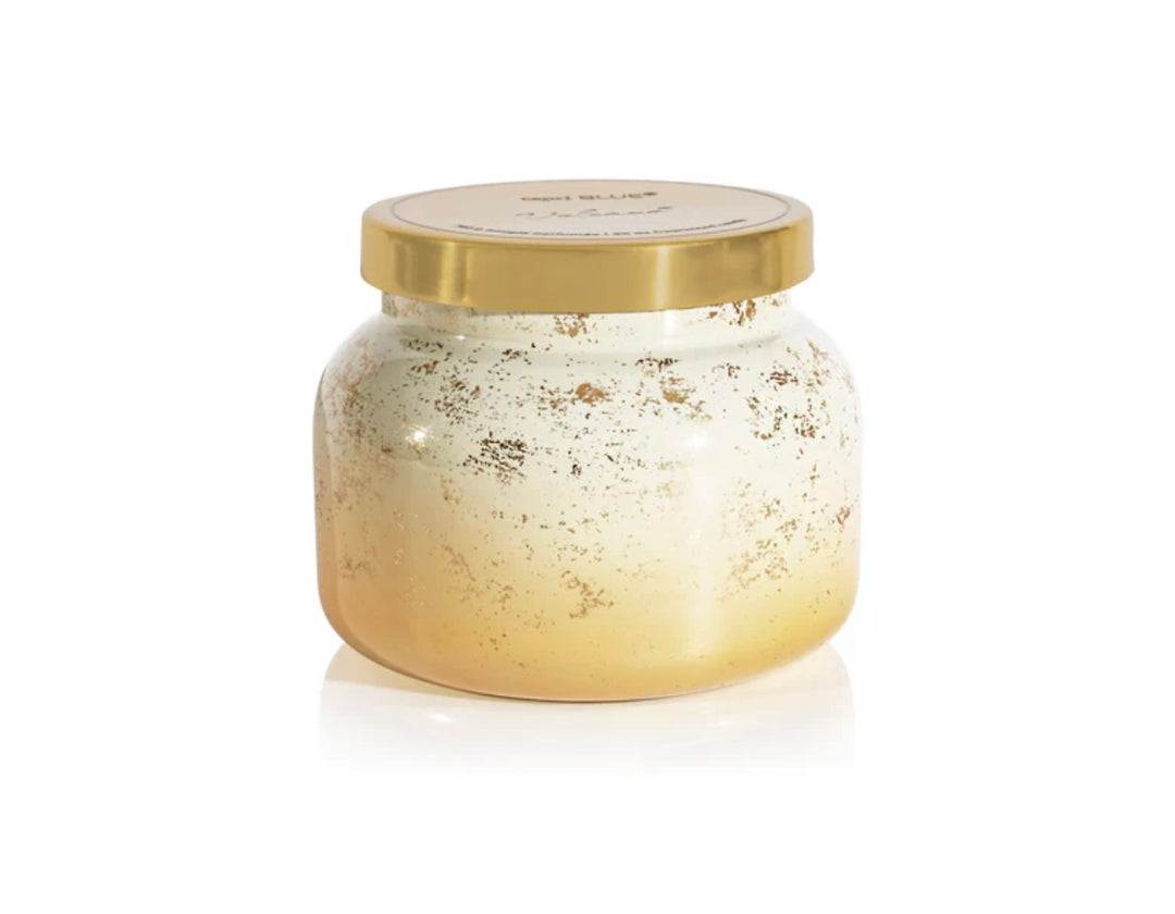 Capri Blue Volcano Glimmer Candle, 28oz, in a winter white  gold jar.