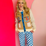 Cream Western cardigan with cowboy boot and horseshoe embroidery and contrast whipstitch trim.