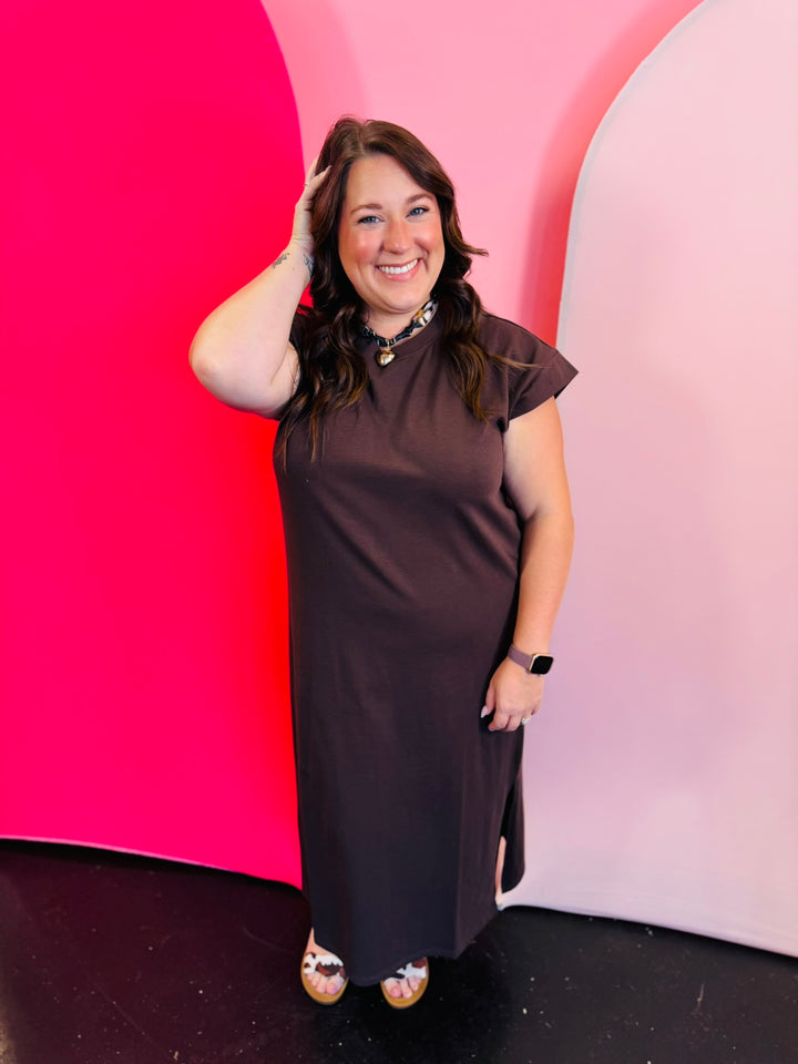 Mahogany midi dress with short sleeves, round neckline, and side slit.