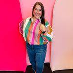 Multicolor striped button-down top with pink, orange, green, and cream stripes.