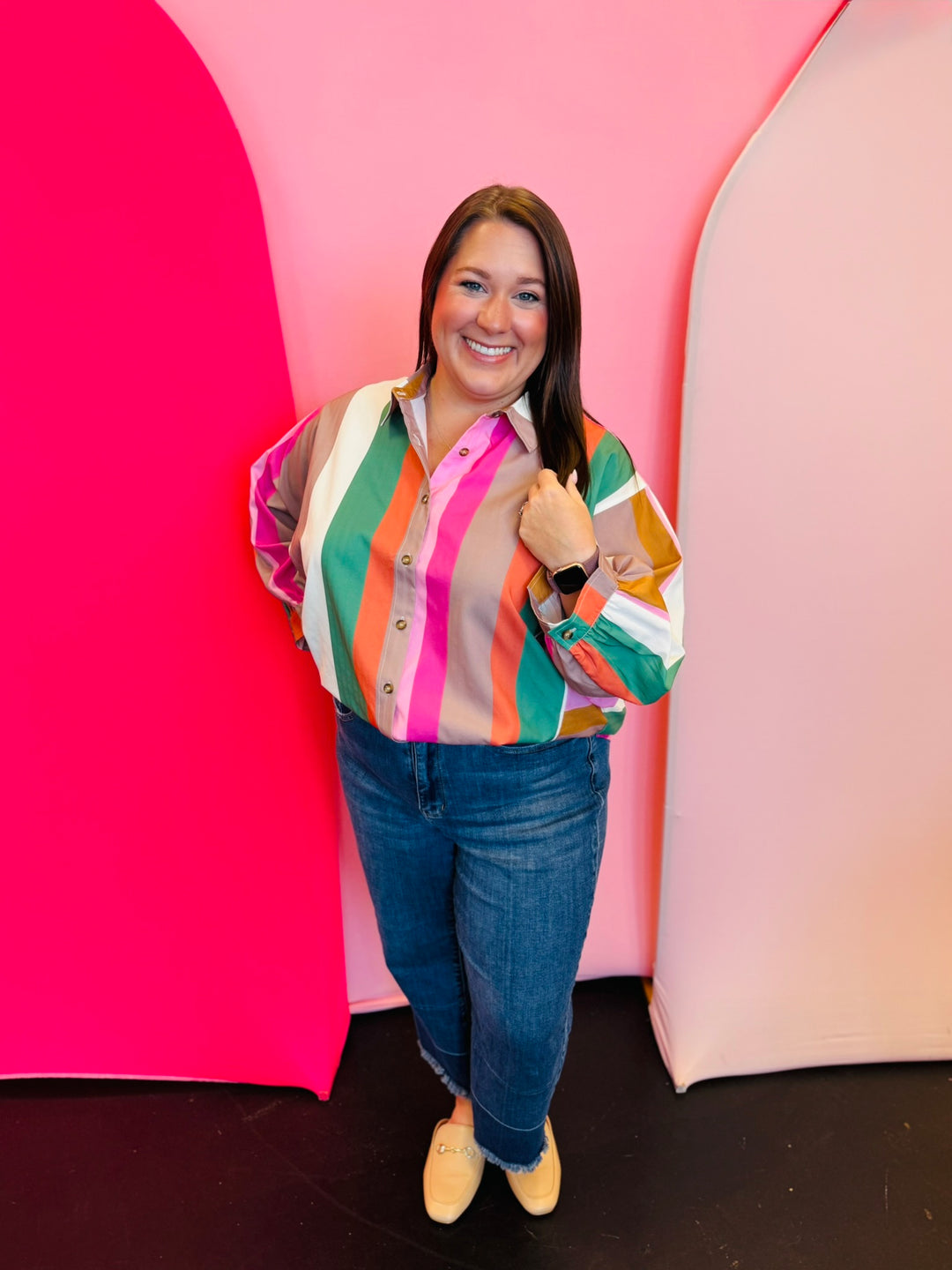 Multicolor striped button-down top with pink, orange, green, and cream stripes.