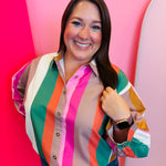 Multicolor striped button-down top with pink, orange, green, and cream stripes.