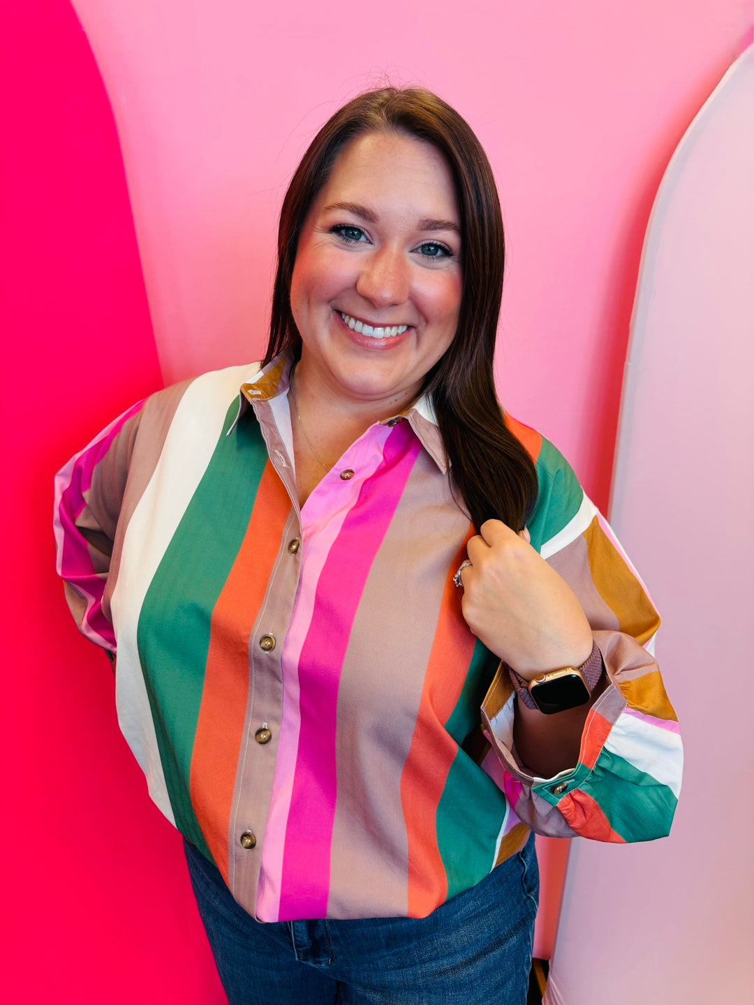 Multicolor striped button-down top with pink, orange, green, and cream stripes.