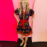Black & Red Floral Dress with short puff sleeves, ruffle hem, removable belt, and side pockets.
