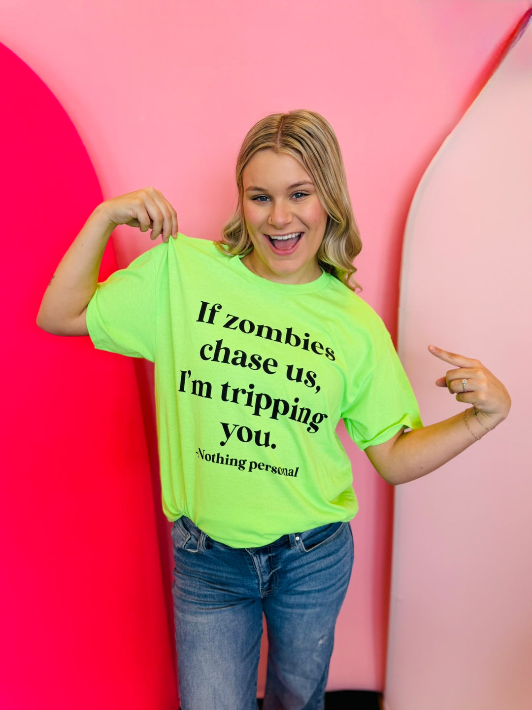 Bright green Zombie Tripping Tee with cheeky “If zombies chase us, I’m tripping you” graphic.