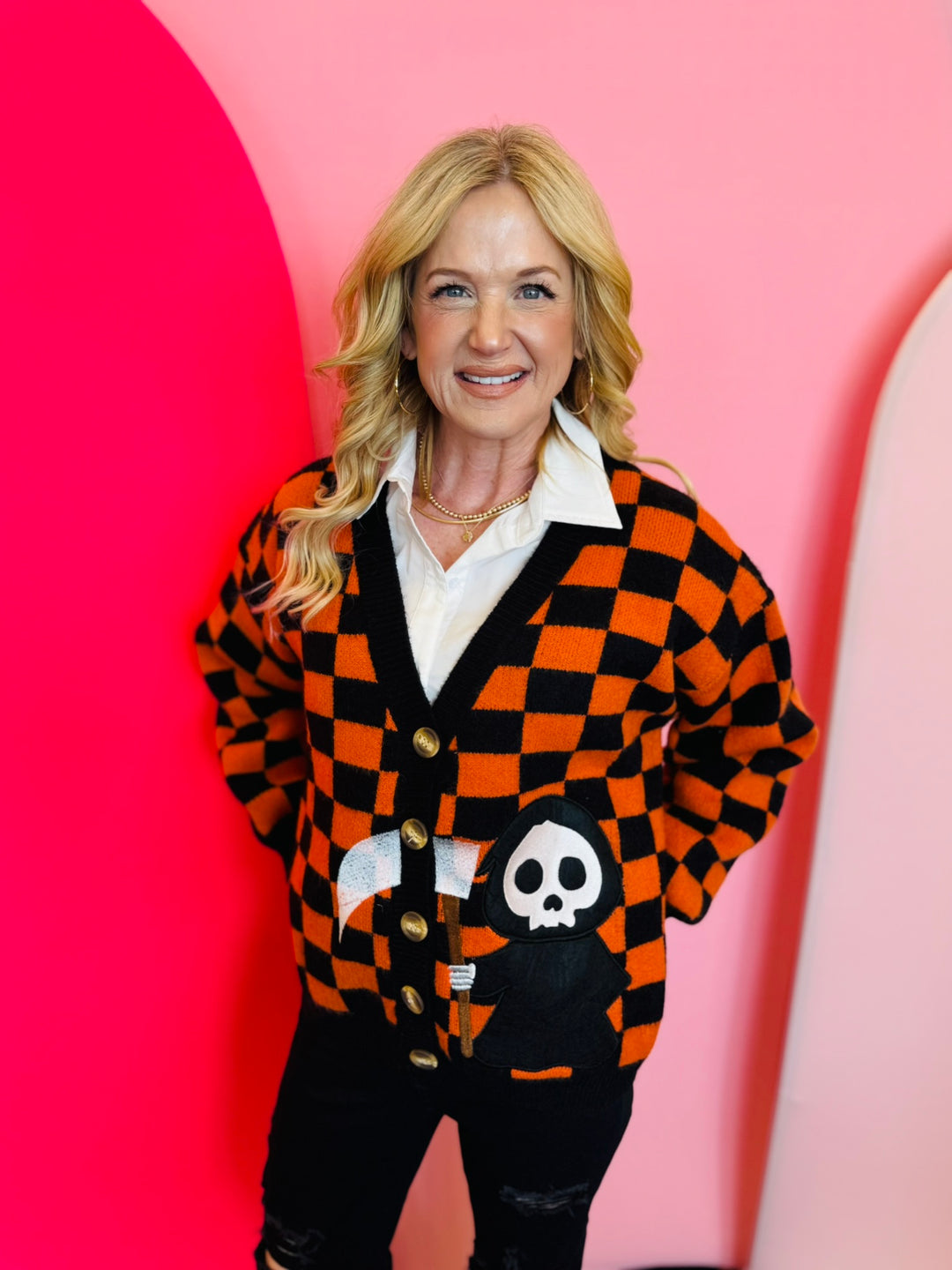 Orange & Black Checkered Reaper Patch Cardigan with soft knit and bold, super fun Halloween design.
