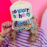 Neutral trucker hat with colorful no worry no hurry embroidery and vibrant patchwork printed bill.