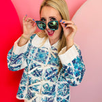 Oversized cat-eye Clarisse sunglasses with gold temples and hand-cut acetate frame.