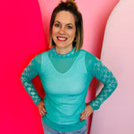 Turquoise checkered mesh top with rhinestone sleeves, lightweight stretchy fabric, perfect for bold trendy outfits.