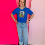 Royal blue tee with sparkling sequin cowboy boots patch and bold Western-inspired style.