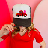 Mavis heart and truck design yarn embroidered trucker cap.