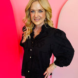 Black 3D floral button-down top with puff sleeves, ruffled neckline, and textured cotton fabric.