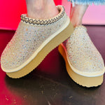 Platform slip-on shoes with rhinestones and fleece lining.