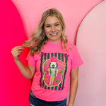 Nutcracker Tee in neon pink with cute nutcracker graphic, unisex fit, and soft 50/50 blend.