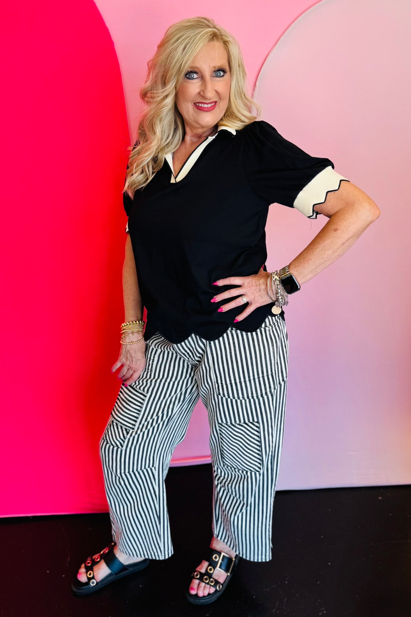 Black twill striped barrel-leg pants with subtle vertical stripes, featuring a natural rope twine belt threaded through eyelet loops; styled for a flattering, modern fit with a breathable 100% cotton fabric.