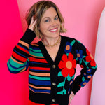 Multicolor floral and striped colorblock cardigan with V-neck, button front, and ribbed trim.