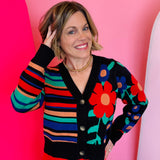 Multicolor floral and striped colorblock cardigan with V-neck, button front, and ribbed trim.