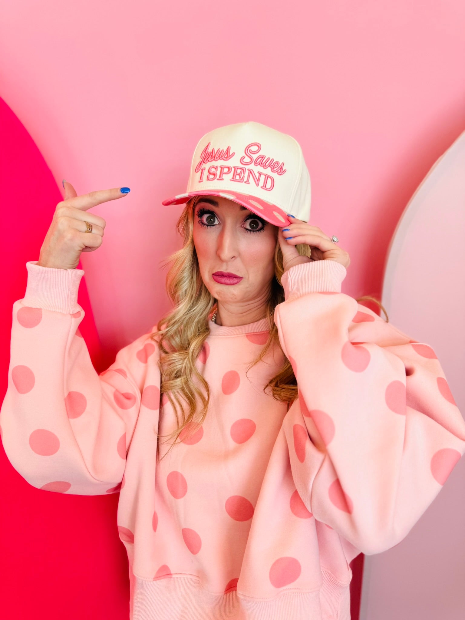 Cream hat with pink polka dot bill and Jesus saves I spend embroidery