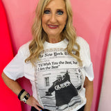 Ivory graphic tee with vintage newspaper design, rhinestones, and crystal-inspired border.