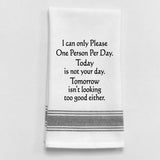 White tea towel with black trim and funny sarcastic quote.
