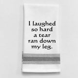 White tea towel with black trim and funny laughter quote.