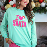 Teal “I Love Santa” sweatshirt with pink embroidery, red Santa hat, and gold sequin outline.