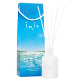 Inis fragrance diffuser with frosted glass vessel and reeds for clean, ocean-inspired home scent.