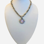 Silver necklace with blush floral pendant and iridescent crystals