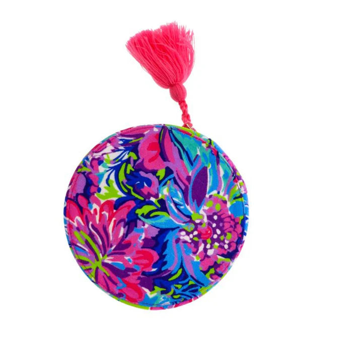 round zippered velvet jewelry case with floral print and hot pink tassel
