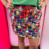 Colorful houndstooth skort with built-in shorts, drawstring waist, and side pockets.