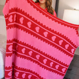 Pink blanket with red stripes and heart accents, soft and cozy in a 50" x 57" size.