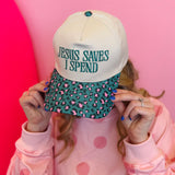Leopard print bill cap with teal embroidered “Jesus Saves I Spend” phrase and adjustable strap.