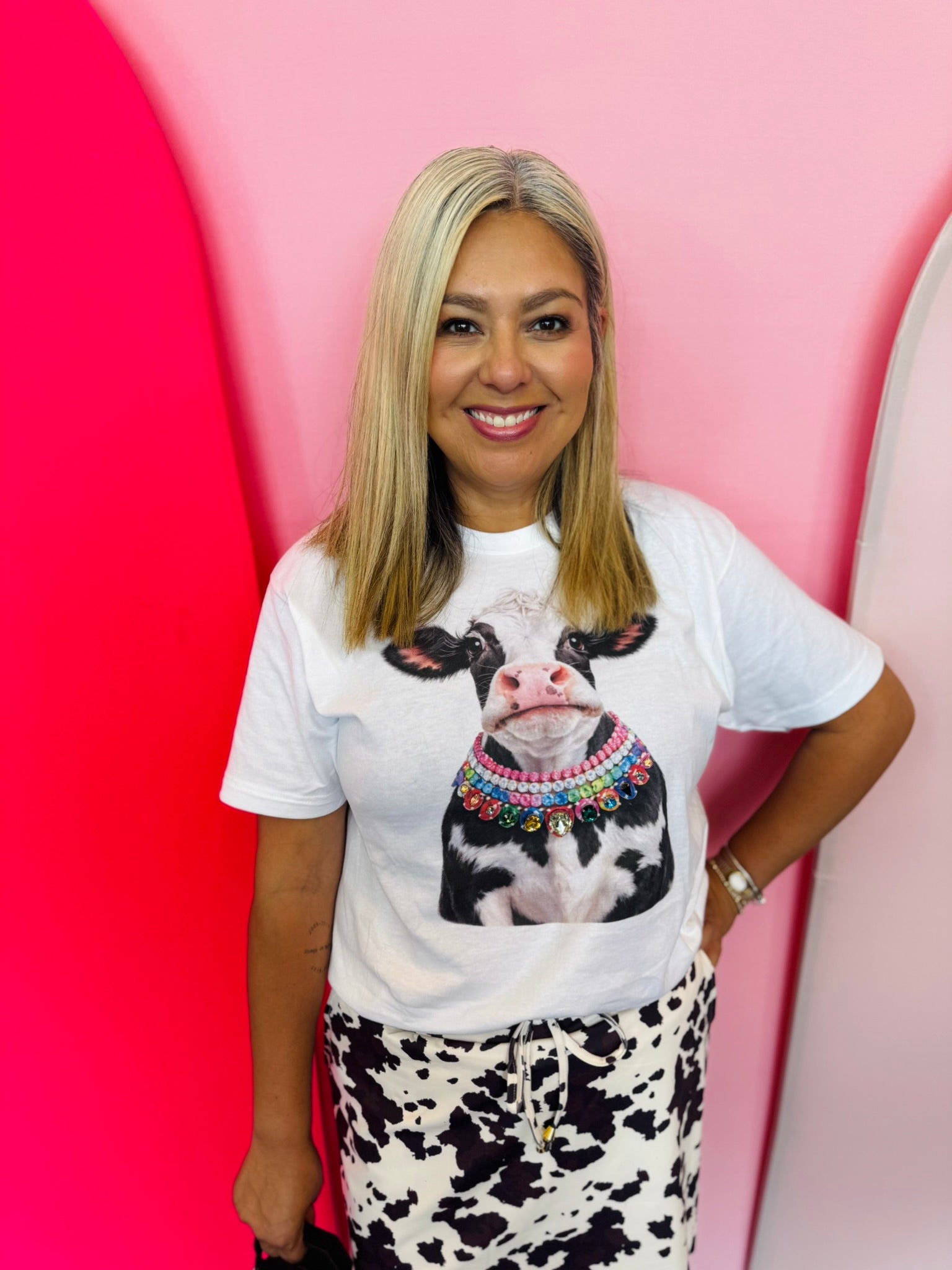 White cow graphic tee with colorful rhinestone necklace accent and premium rhinestone details