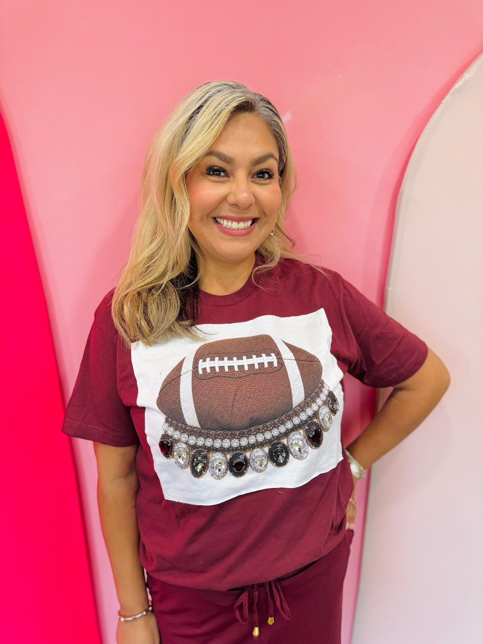 Maroon football tee with oversized maroon and clear rhinestone crystals and football patch.