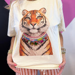 Natural tiger graphic tee with layered necklace design and sparkling multicolored jewels.