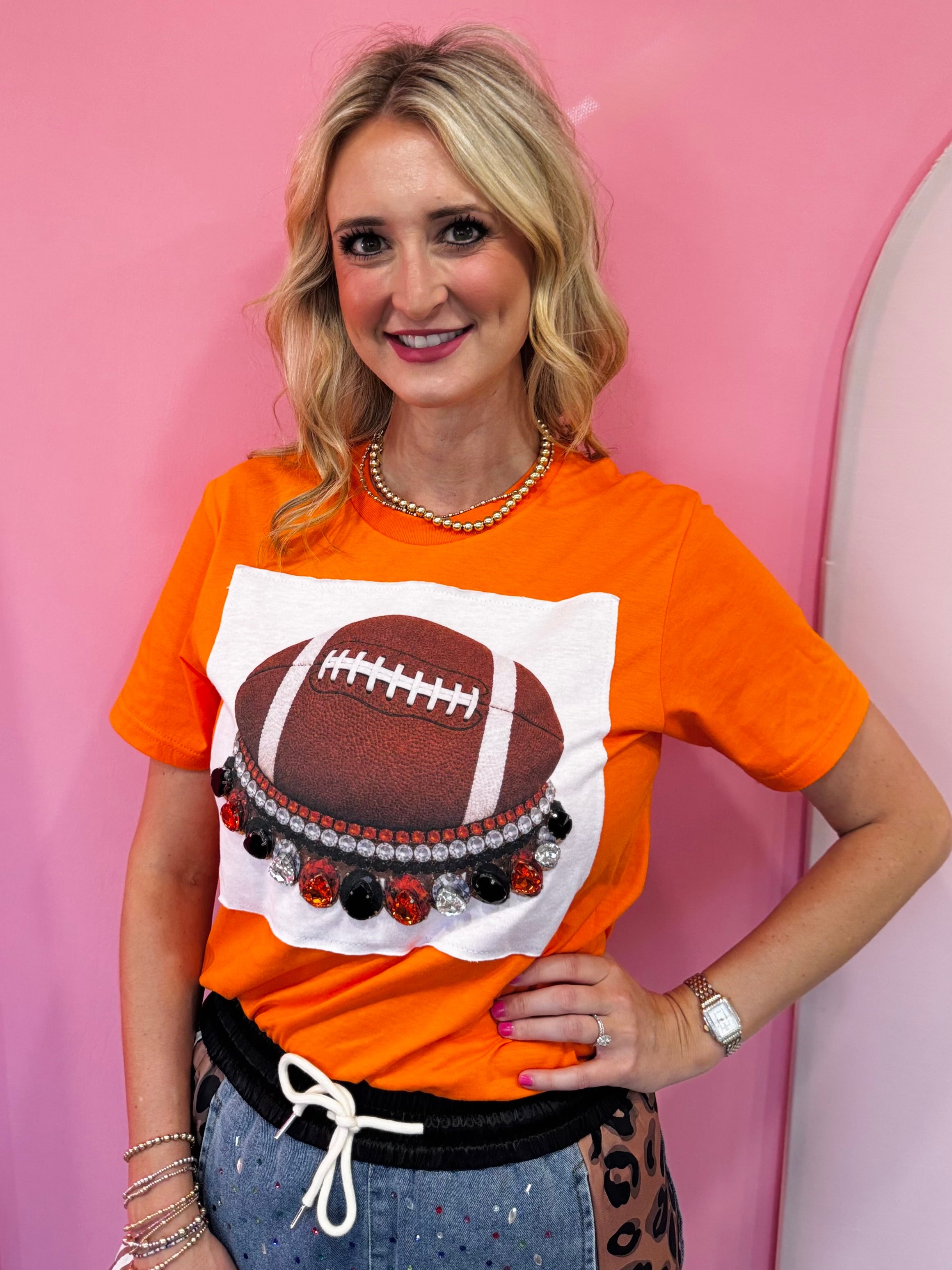 Orange football tee with oversized orange, black, and clear rhinestone jeweled collar.