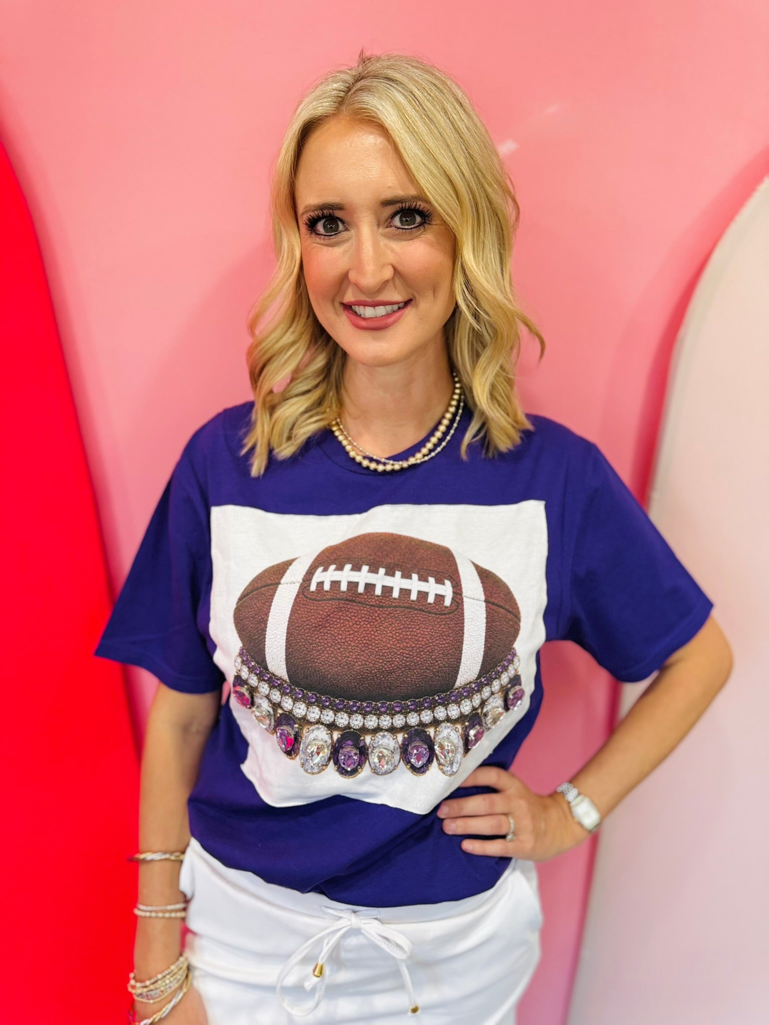 Purple football tee with oversized purple and clear rhinestone crystals and football patch.