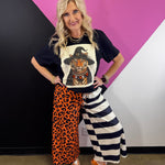 Black tiger witch tee with jeweled orange, black, and iridescent crystal collar.