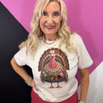 Turkey graphic tee with oversized multicolored jewel necklace and sparkling rhinestone accents.