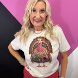 Turkey graphic tee with oversized multicolored jewel necklace and sparkling rhinestone accents.