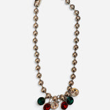 Metallic ball bead necklace with emerald, ruby, and champagne crystal drops.