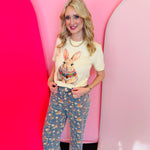 Cream colored bunny graphic tee with jeweled rhinestone collar on soft 100% cotton fabric.