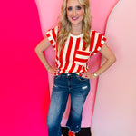 Red striped cropped top with drop shoulders, chest pocket, and textured rib fabric.