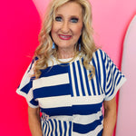 Royal blue and white striped colorblock top with mixed stripe panels and relaxed drop shoulder fit