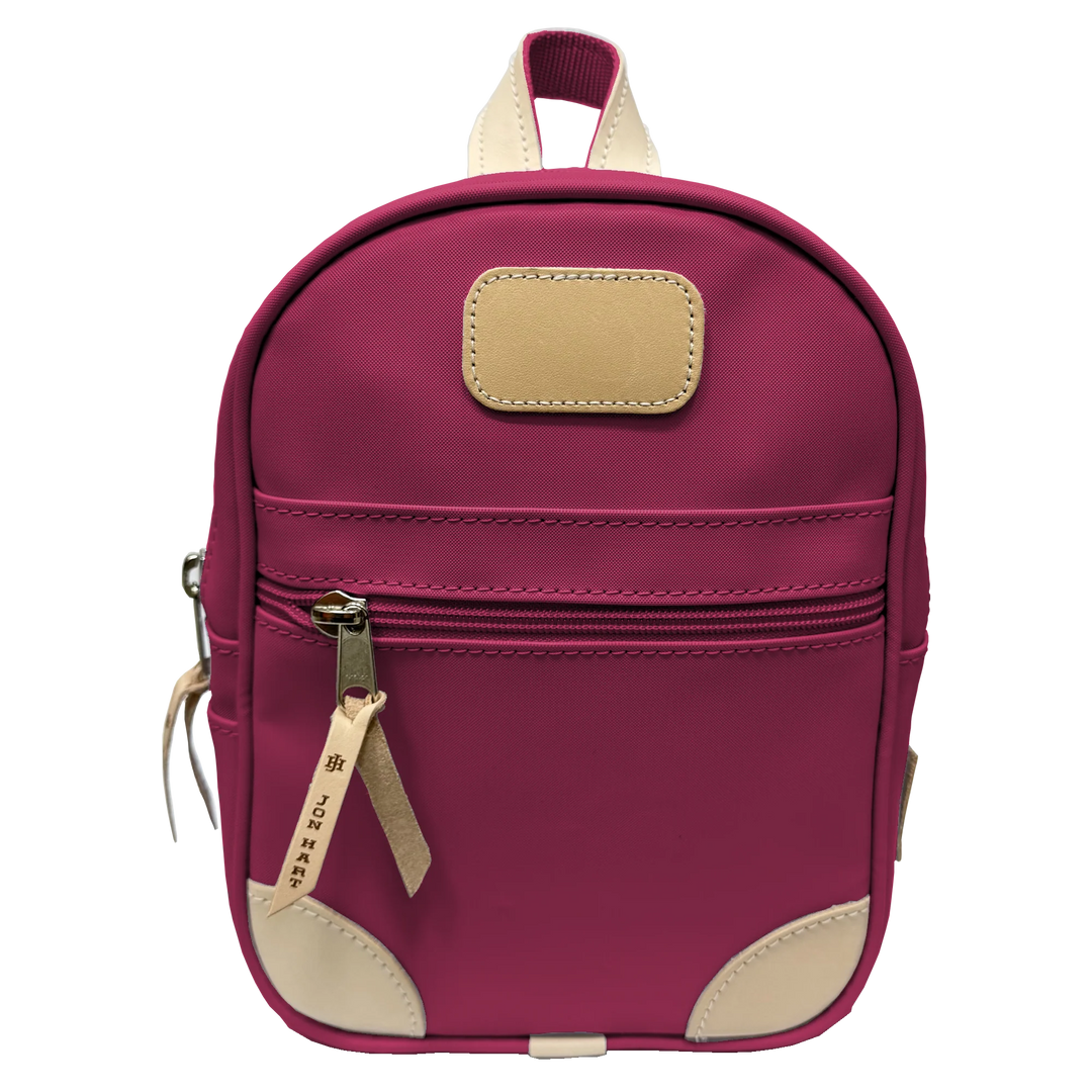 Jon Hart Mini Backpack, 11.5x9x3.75 in, coated canvas with leather trim.
