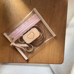 Jon Hart clear pocket pouch for chargers, small accessories, and everyday organization.